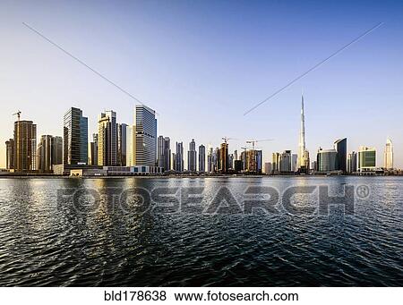 Dubai city skyline and waterfront, United Arab Emirates View Large Photo Image Stock Photo - Dubai city skyline and waterfront, United Arab Emirates. Fotosearch