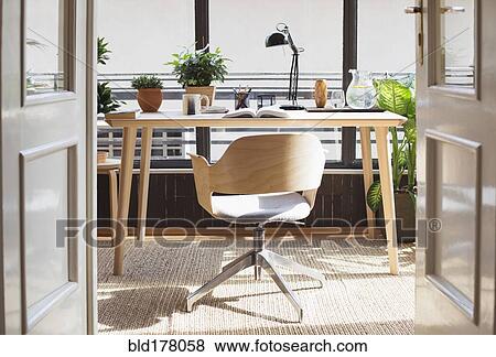 Empty chair in home study View Large Photo Image Stock Photo - Empty chair in home study. Fotosearch