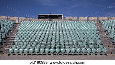 Stock Image - Empty chairs in outdoor amphitheater. Fotosearch