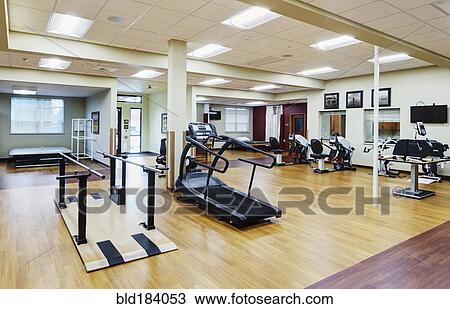 Stock Image - Empty gym in assisted living facility. Fotosearch