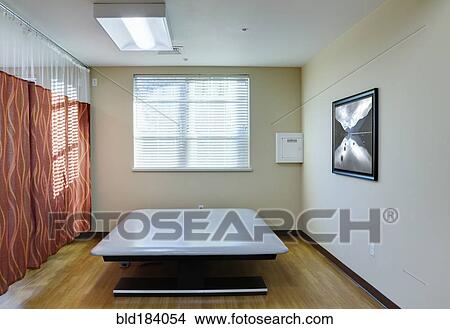 Picture - Empty massage tables in assisted living facility. Fotosearch