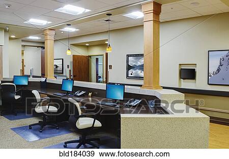 Stock Photo - Empty receptionist desk in assisted living facility. Fotosearch