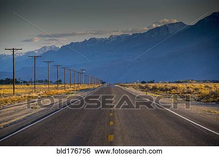 Empty road in remote landscape View Large Photo Image Stock Photograph - Empty road in remote landscape. Fotosearch