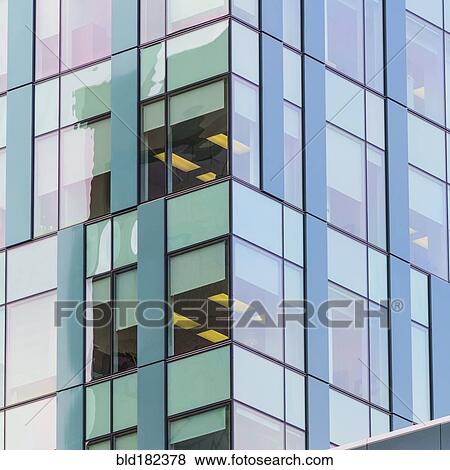 Stock Photo - Exterior of modern highrise building. Fotosearch