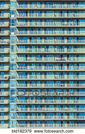 Stock Photo - Exterior of modern highrise building. Fotosearch
