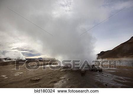 Geyser steam in remote field View Large Photo Image Picture - Geyser steam in remote field. Fotosearch