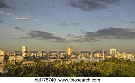 Stock Image - "Havana city skyline and cloudy sky, Havana, Cuba". Fotosearch