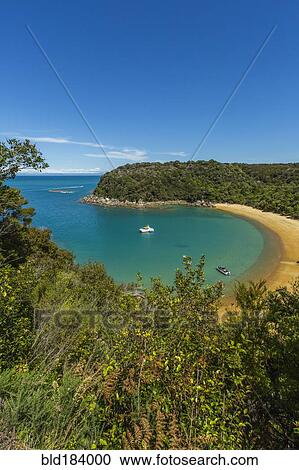 High angle view of boats in remote beach cove View Large Photo Image Stock Image - High angle view of boats in remote beach cove. Fotosearch