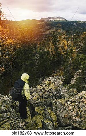 High angle view of hiker on remote mountaintop, Ural, Ural, Russia View Large Photo Image Stock Photo - High angle view of hiker on remote mountaintop, Ural, Ural, Russia. Fotosearch