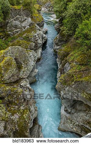 Stock Image - High angle view of river in rock formation. Fotosearch