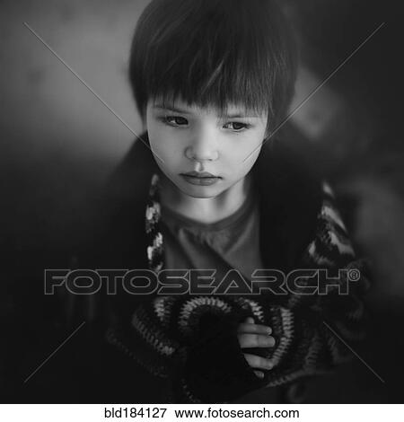 Stock Photo - High angle view of sad Caucasian girl. Fotosearch