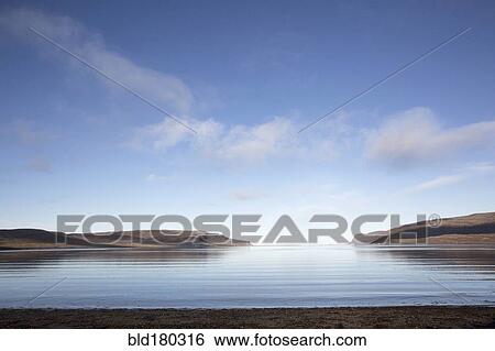 Hills and remote ocean horizon View Large Photo Image Stock Photograph - Hills and remote ocean horizon. Fotosearch