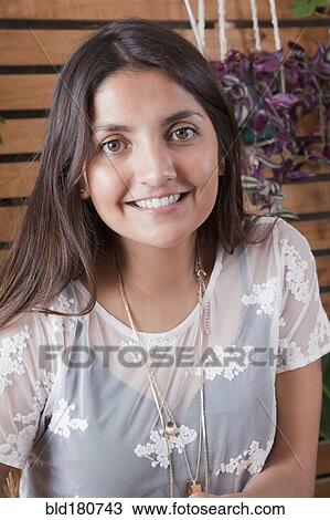 Hispanic woman smiling View Large Photo Image Stock Image - Hispanic woman smiling. Fotosearch