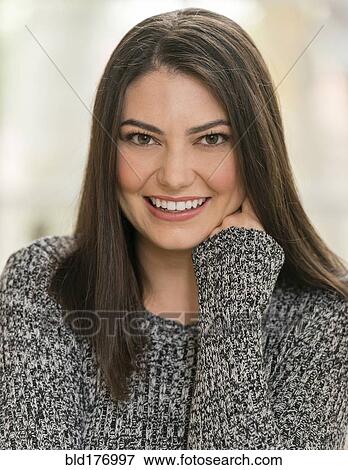 Hispanic woman smiling View Large Photo Image Stock Photo - Hispanic woman smiling. Fotosearch