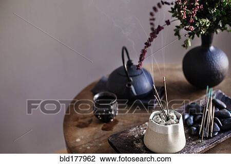 Incense burning on table View Large Photo Image Stock Image - Incense burning on table. Fotosearch