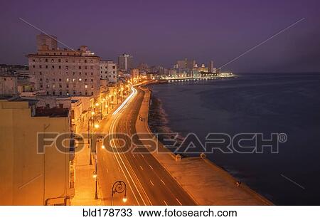 "Long exposure of cars on waterfront at night, Havana, Cuba" View Large Photo Image Stock Image - "Long exposure of cars on waterfront at night, Havana, Cuba". Fotosearch