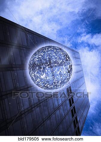 Low angle view of orb floating near highrise building View Large Photo Image Stock Photography - Low angle view of orb floating near highrise building. Fotosearch