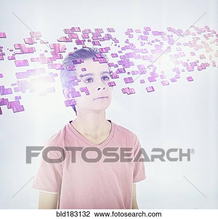 Stock Image - Mixed race boy looking at floating blocks. Fotosearch
