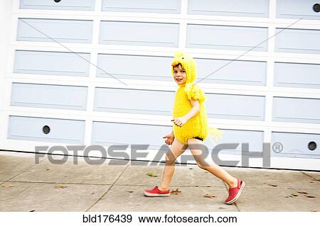 Stock Photo - Mixed race boy wearing costume. Fotosearch
