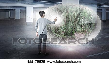 Stock Photography - Mixed race boy with forest globe in parking lot. Fotosearch