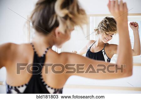 Mixed race dancer practicing in studio View Large Photo Image Stock Image - Mixed race dancer practicing in studio. Fotosearch