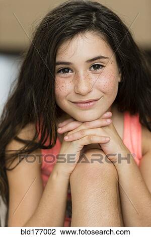 Mixed race girl smiling View Large Photo Image Stock Image - Mixed race girl smiling. Fotosearch