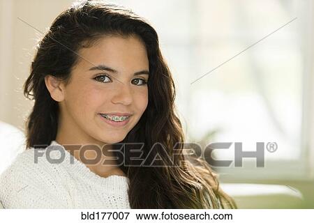 Mixed race girl smiling View Large Photo Image Stock Photo - Mixed race girl smiling. Fotosearch