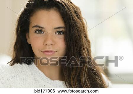 Stock Photograph - Mixed race girl smiling. Fotosearch