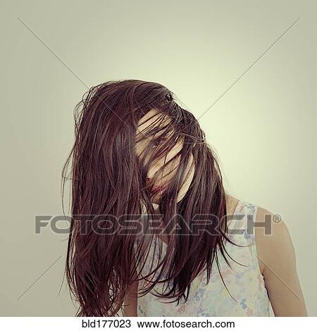 Mixed race girl tossing her hair View Large Photo Image Stock Image - Mixed race girl tossing her hair. Fotosearch