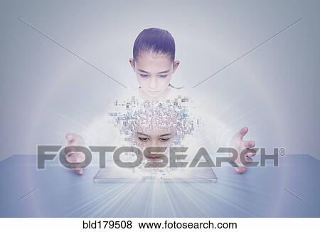 Stock Photo - Mixed race girl with digital projection of face. Fotosearch