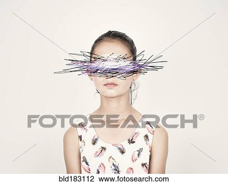 Stock Image - Mixed race girl with eyes scribbled out. Fotosearch