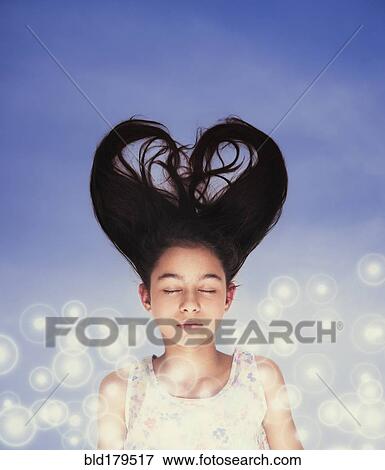Mixed race girl with heart-shaped hair View Large Photo Image Stock Photo - Mixed race girl with heart-shaped hair. Fotosearch