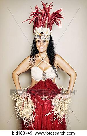 Stock Photo - Mixed race hula dancer wearing traditional costume. Fotosearch