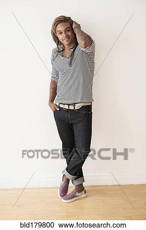 Stock Image - Mixed race man smiling. Fotosearch
