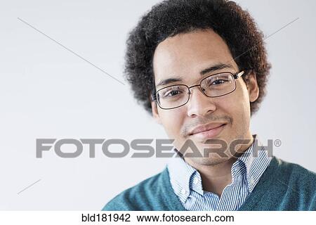 Mixed race man smiling View Large Photo Image Stock Image - Mixed race man smiling. Fotosearch