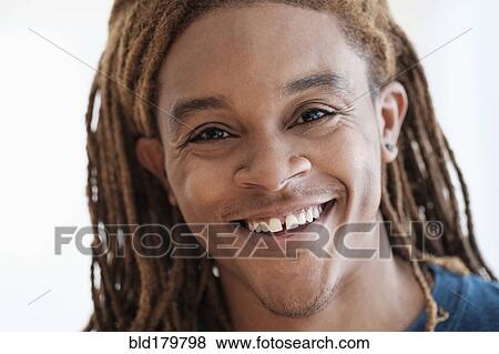 Mixed race man smiling View Large Photo Image Stock Photo - Mixed race man smiling. Fotosearch
