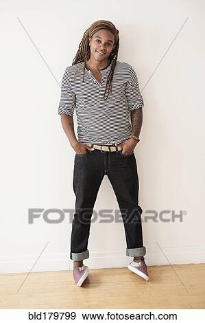 Stock Photo - Mixed race man smiling. Fotosearch