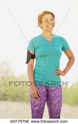 Mixed race runner smiling outdoors View Large Photo Image Stock Photograph - Mixed race runner smiling outdoors. Fotosearch