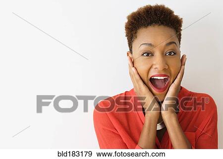 Mixed race woman gasping View Large Photo Image Stock Photo - Mixed race woman gasping. Fotosearch