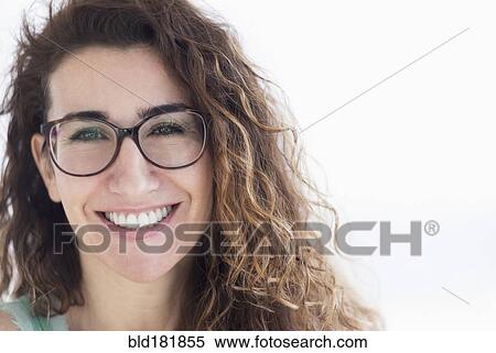 Mixed race woman wearing eyeglasses View Large Photo Image Stock Photography - Mixed race woman wearing eyeglasses. Fotosearch