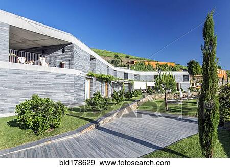 Modern hotel and wooden walkway View Large Photo Image Stock Photo - Modern hotel and wooden walkway. Fotosearch