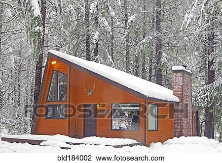 Modern wood cabin in snowy forest View Large Photo Image Stock Image - Modern wood cabin in snowy forest. Fotosearch