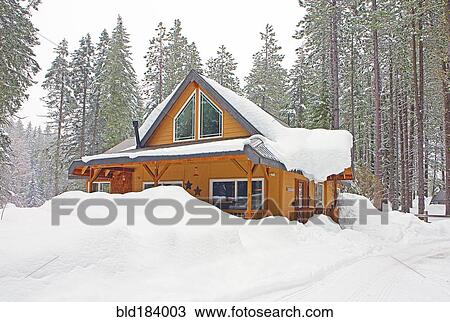 Modern wood cabin in snowy forest View Large Photo Image Stock Image - Modern wood cabin in snowy forest. Fotosearch