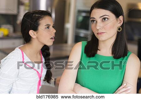 Mother and daughter arguing in kitchen View Large Photo Image Stock Photography - Mother and daughter arguing in kitchen. Fotosearch