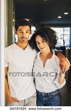 Mother and son hugging in doorway View Large Photo Image Picture - Mother and son hugging in doorway. Fotosearch
