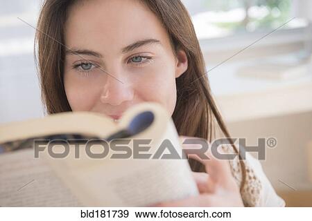 Native American woman reading book View Large Photo Image Stock Photo - Native American woman reading book. Fotosearch