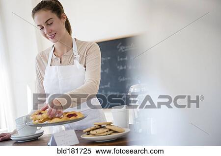 Stock Photography - Native American woman working in cafe. Fotosearch