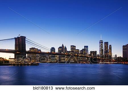 Stock Image - "New York cityscape and Brooklyn Bridge, New York, United States". Fotosearch