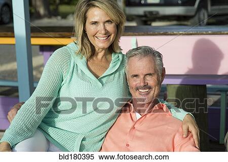 Older Caucasian couple hugging outdoors View Large Photo Image Stock Photography - Older Caucasian couple hugging outdoors. Fotosearch