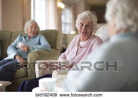 Older Caucasian women talking in nursing home View Large Photo Image Stock Photo - Older Caucasian women talking in nursing home. Fotosearch